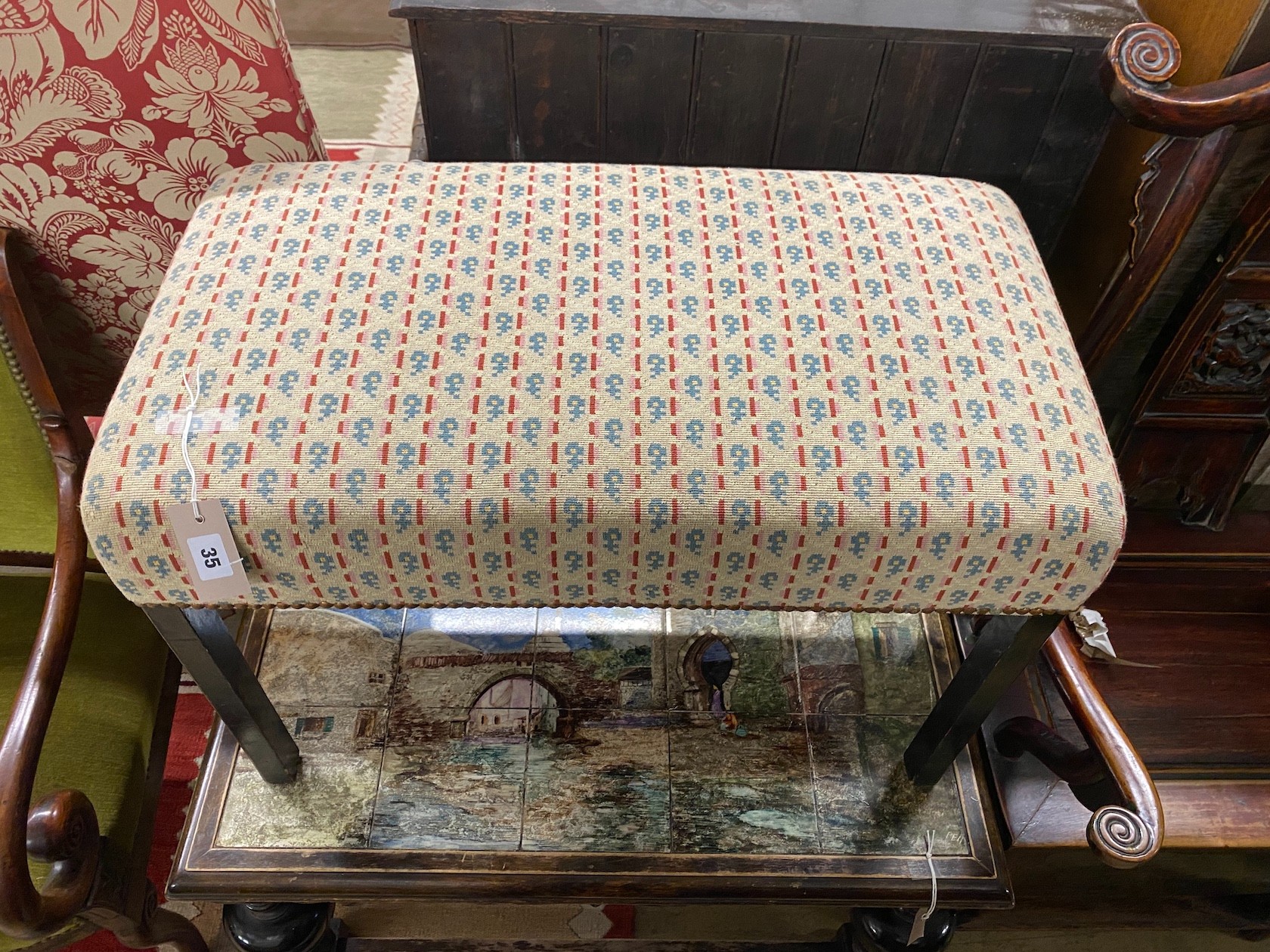 A George III style rectangular upholstered ebonised dressing stool, length 71cm, depth 40cm, height 50cm